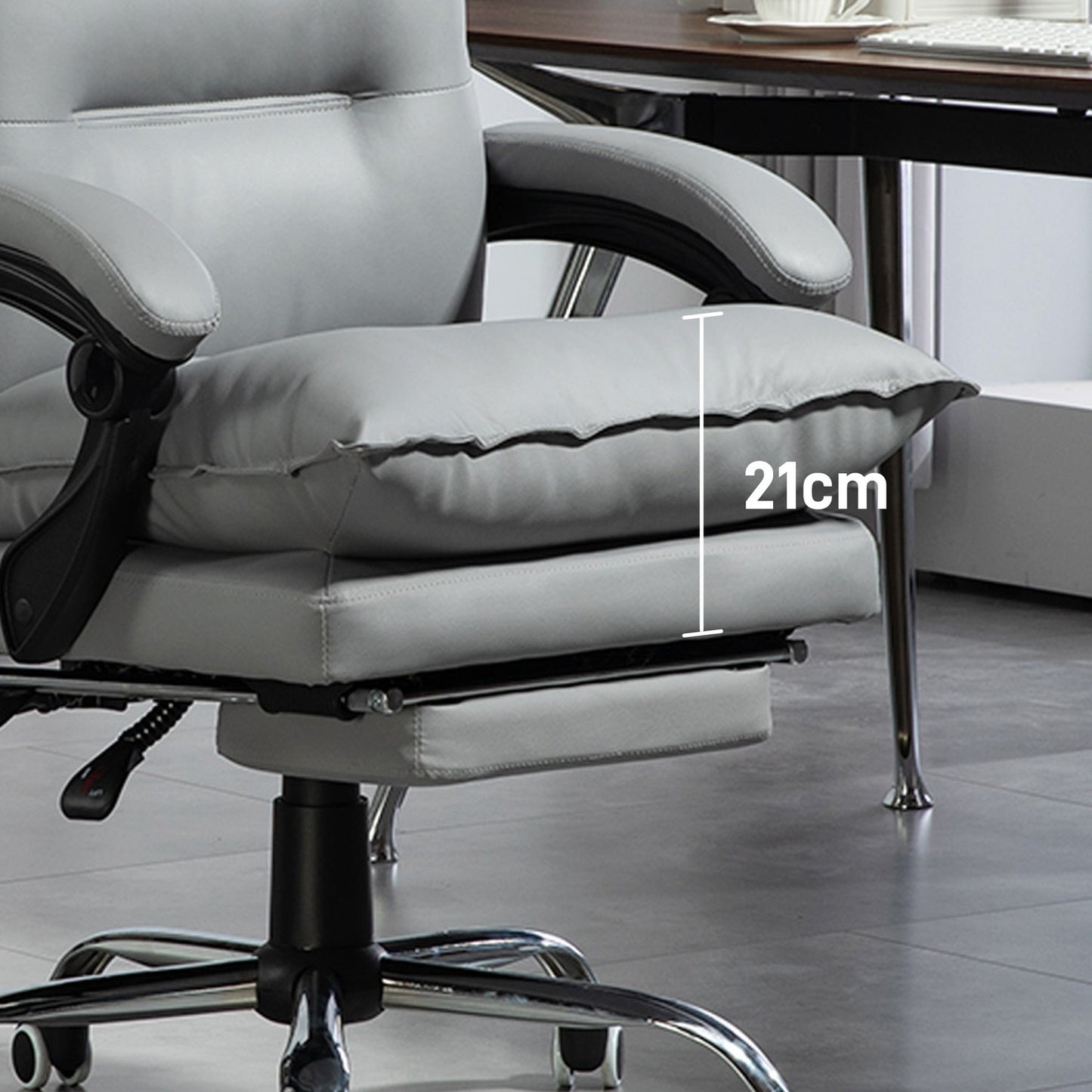Ergonomic office chair with footrest, reclining and padded