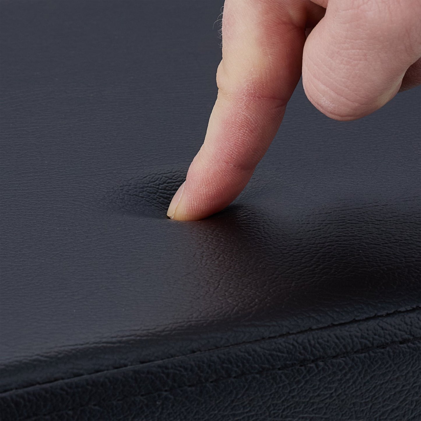 Ottoman in black artificial leather