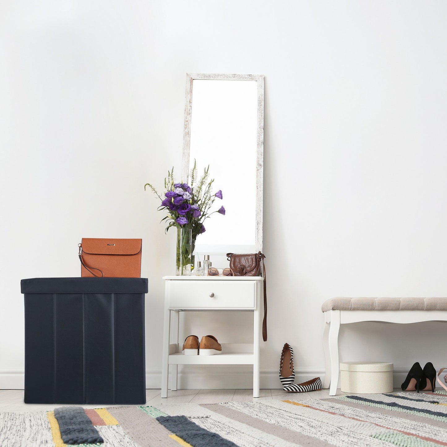 Ottoman in black artificial leather