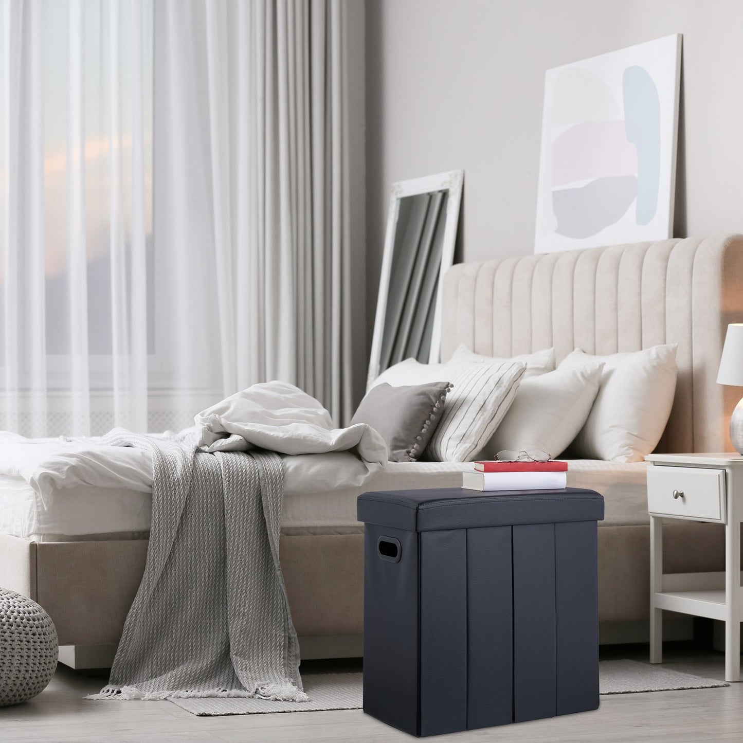 Ottoman in black artificial leather