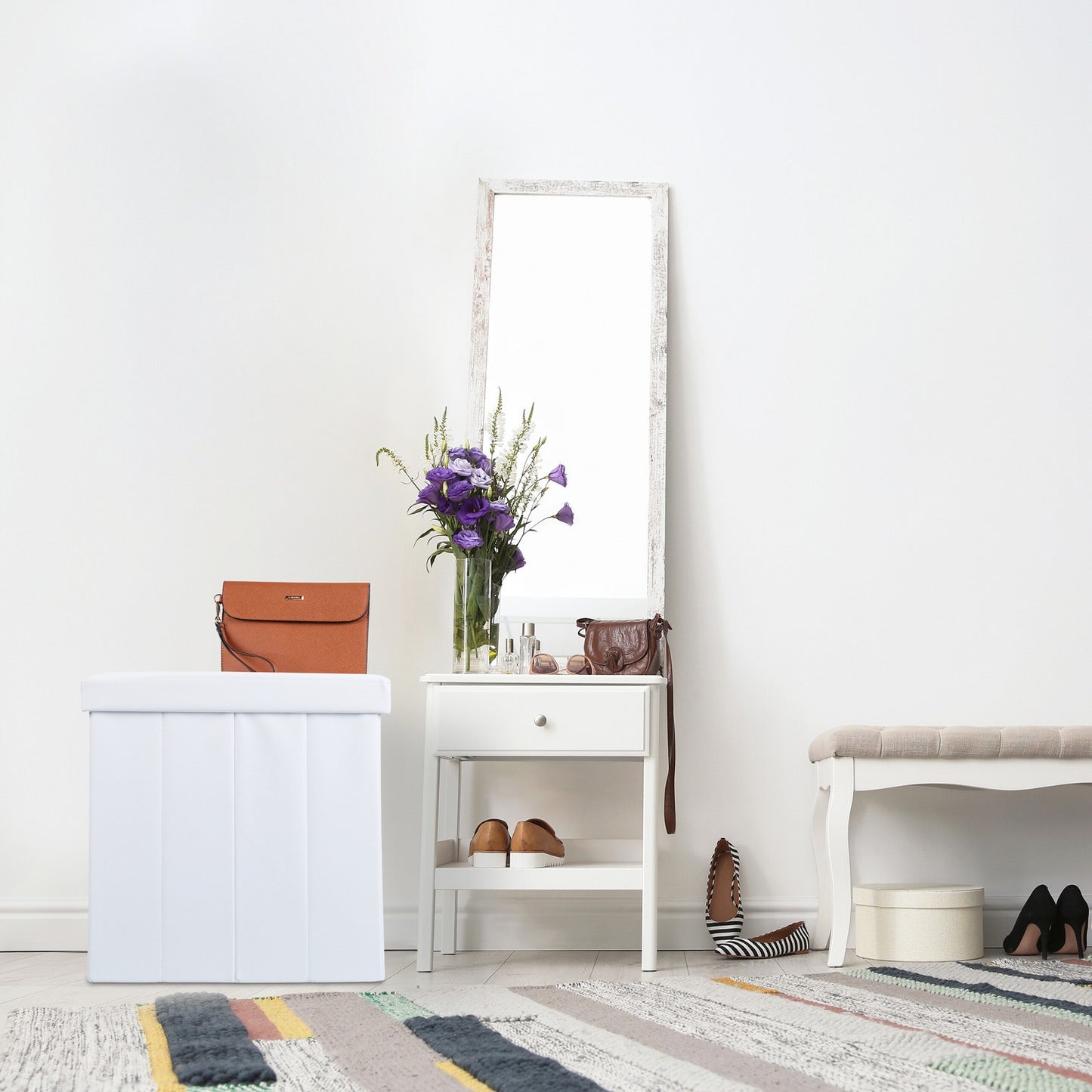 Ottoman in white artificial leather