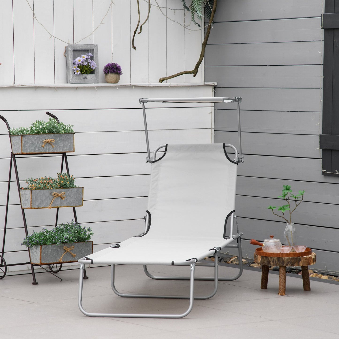 Folding sun lounger with 4-position backrest and roof
