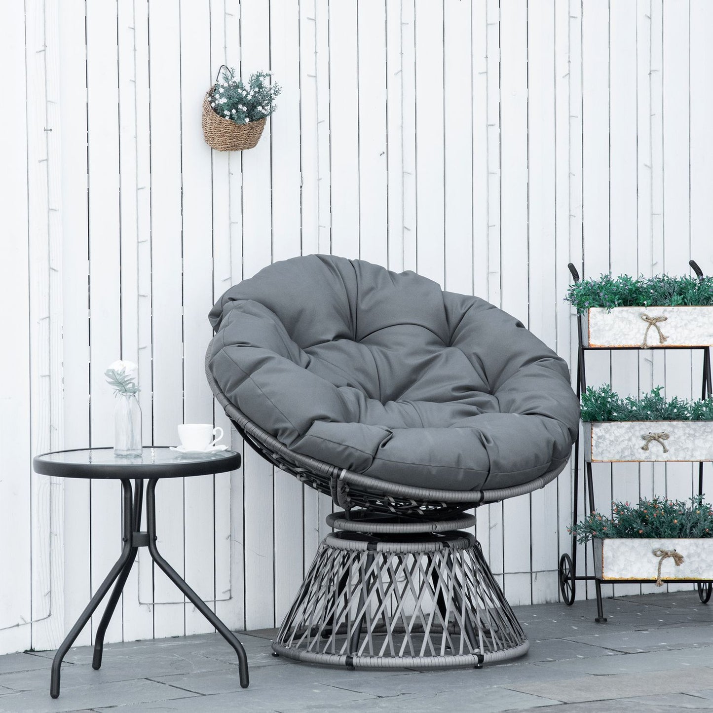 Gray rattan Papasan chair with upholstery, 360° rotatable