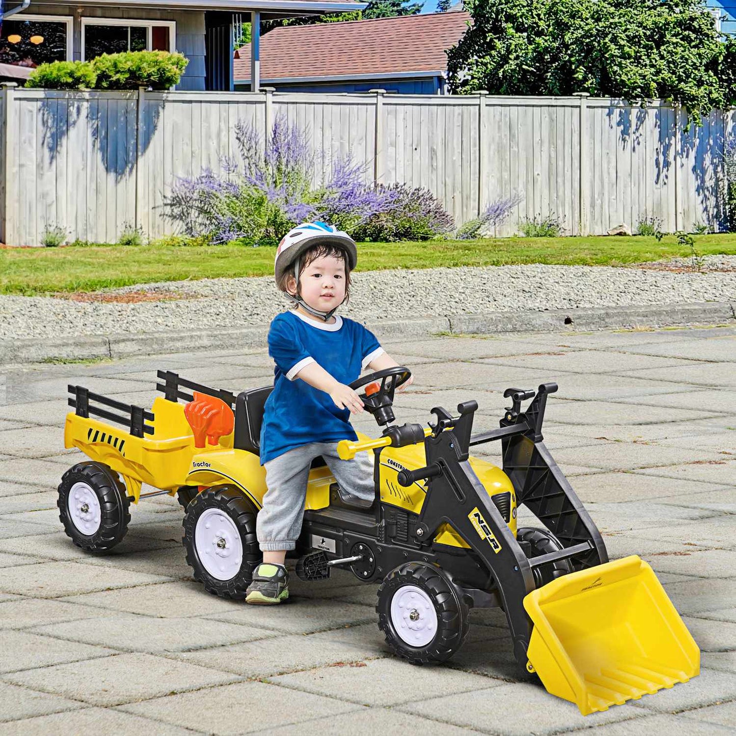Yellow pedal tractor and trailer for children 3+ with shovel
