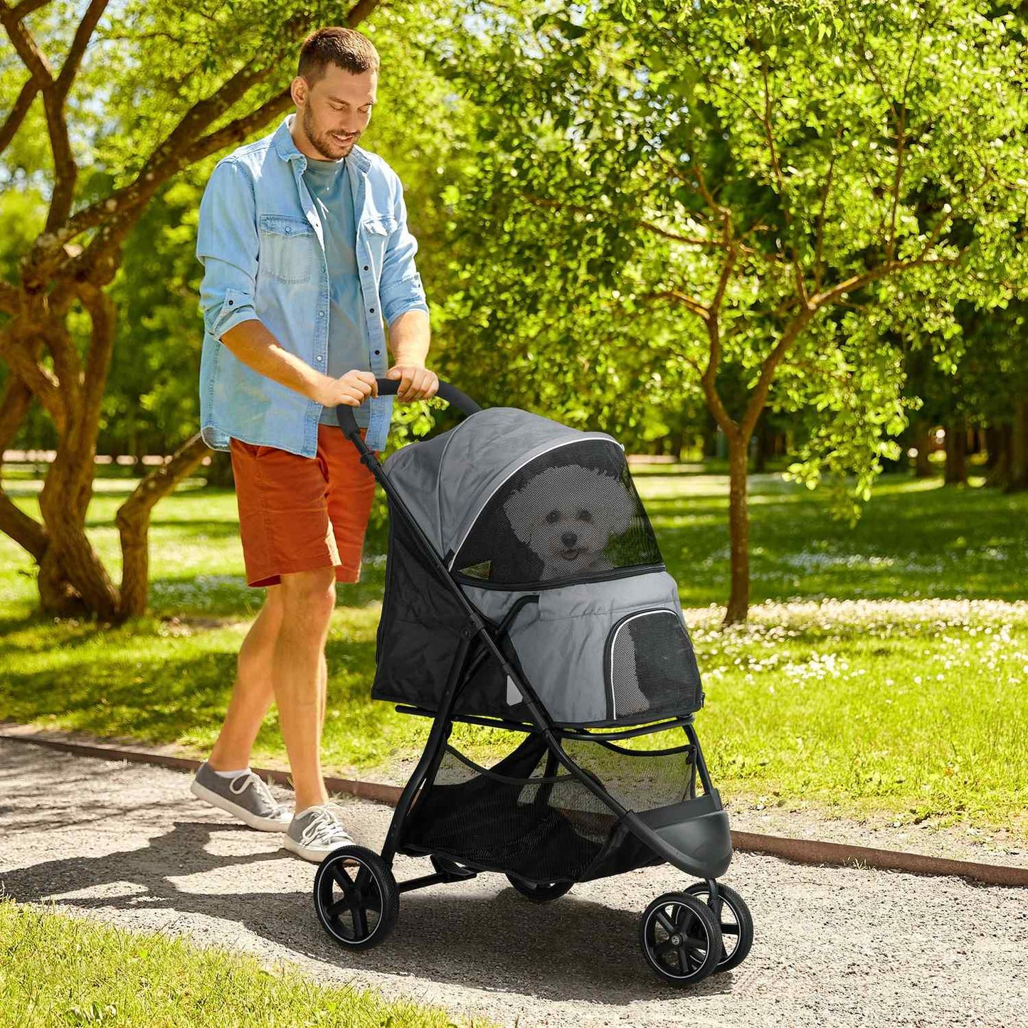 Small dog carriage with rain cover and storage basket