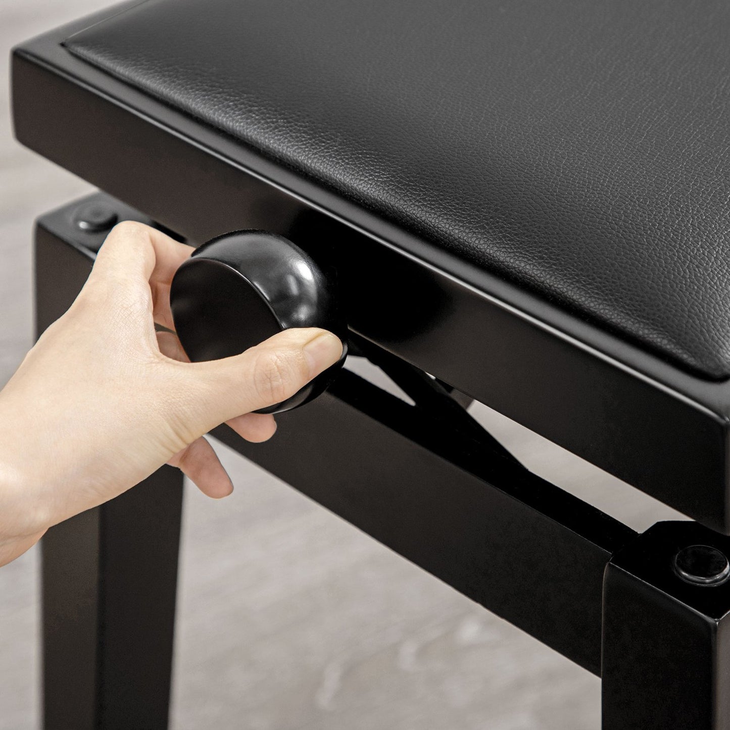 Height-adjustable piano bench with leather cushion, black