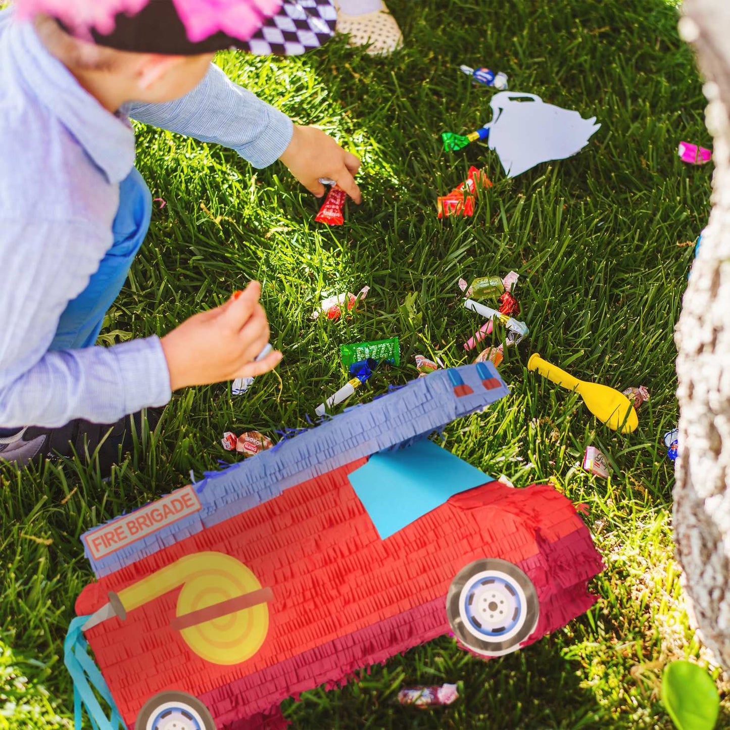 Pinata fire engine with stick and mask