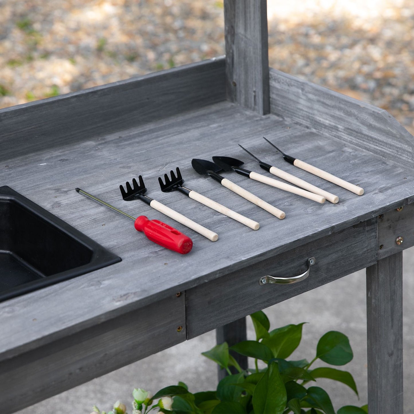 Outdoor planting table with sink & storage, gray spruce wood
