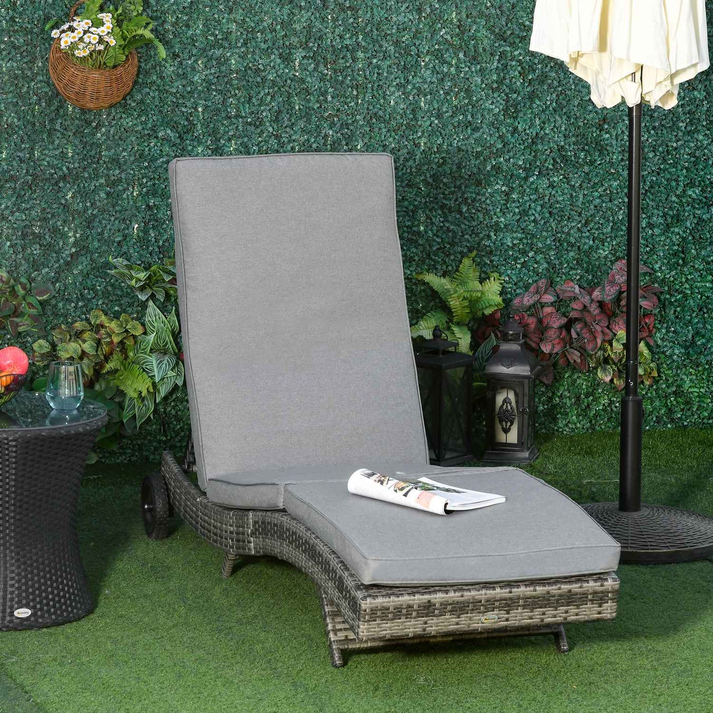 Adjustable sun lounger in poly rattan with cushion, grey