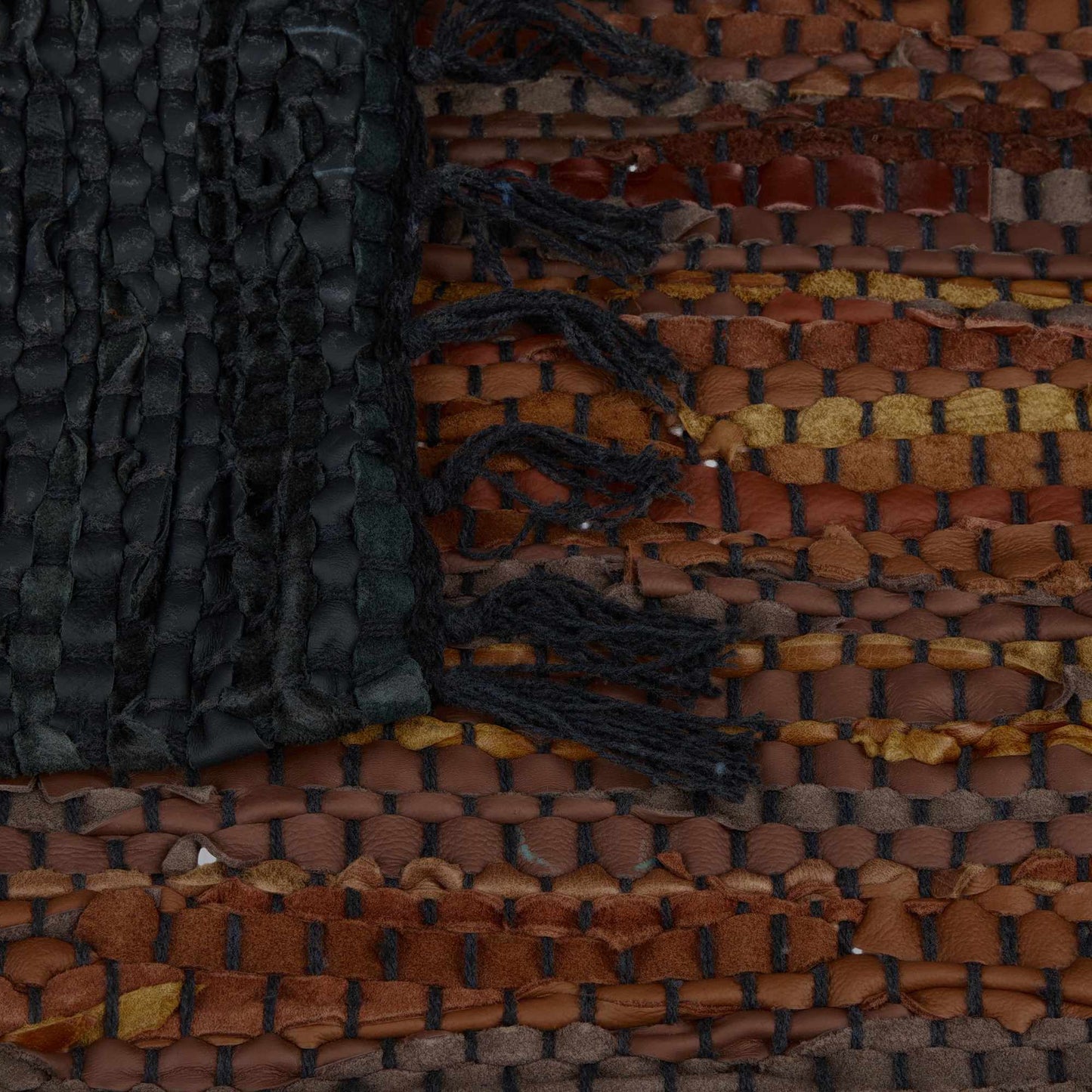 Rag rug in leather and cotton