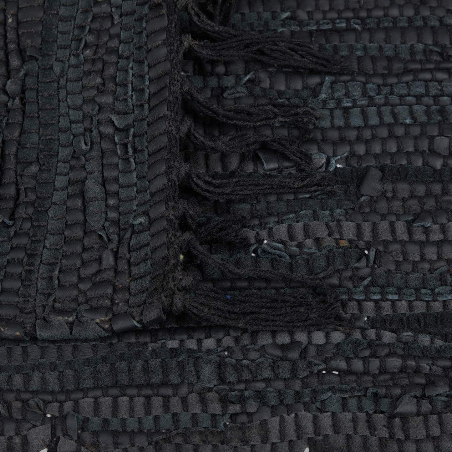 Rag rug in leather and cotton