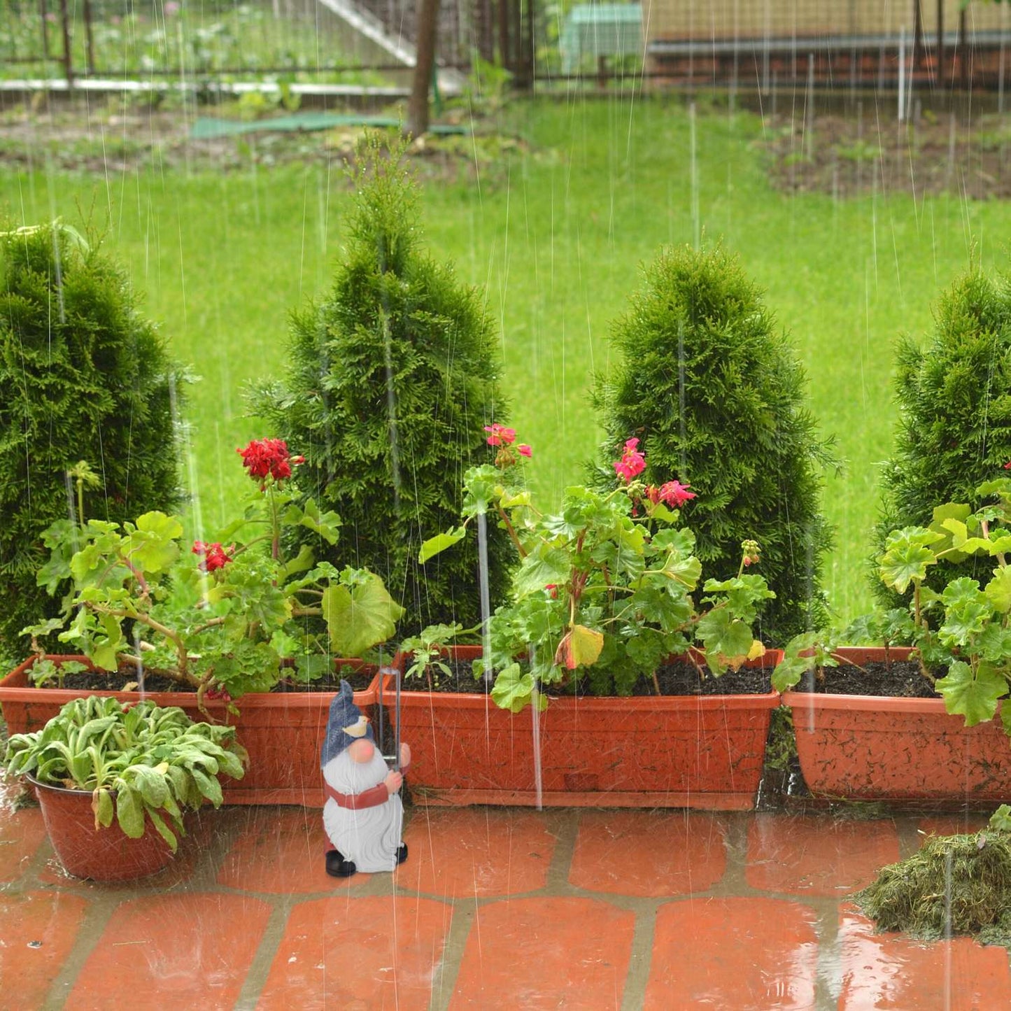 Rain gauge garden gnome
