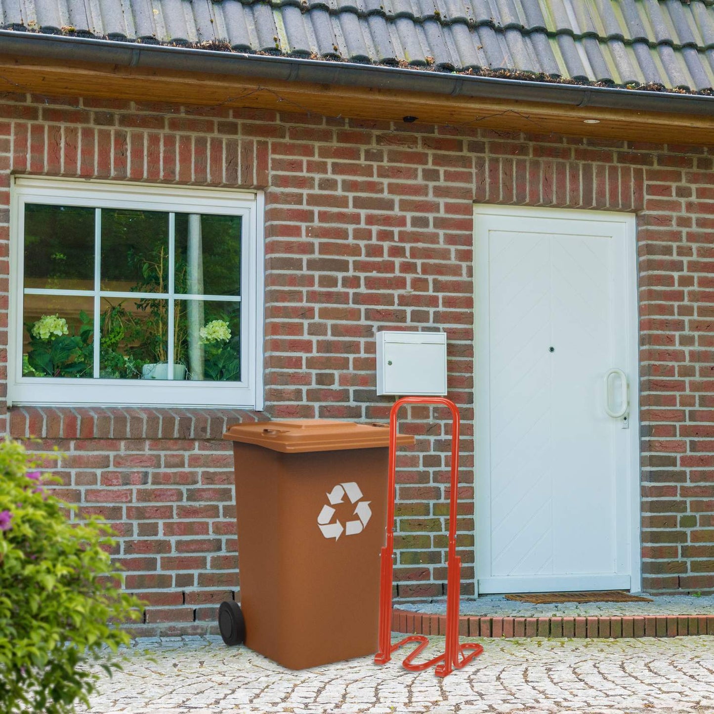 Red waste compactor for the dustbin