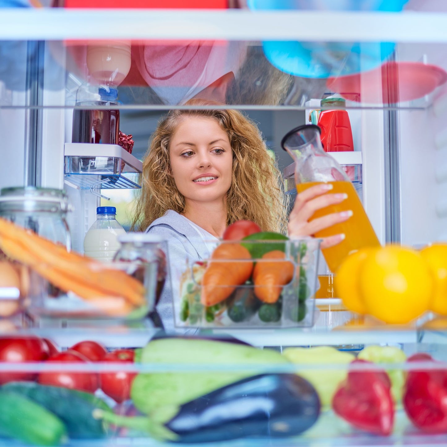 Refrigerator storage with handle
