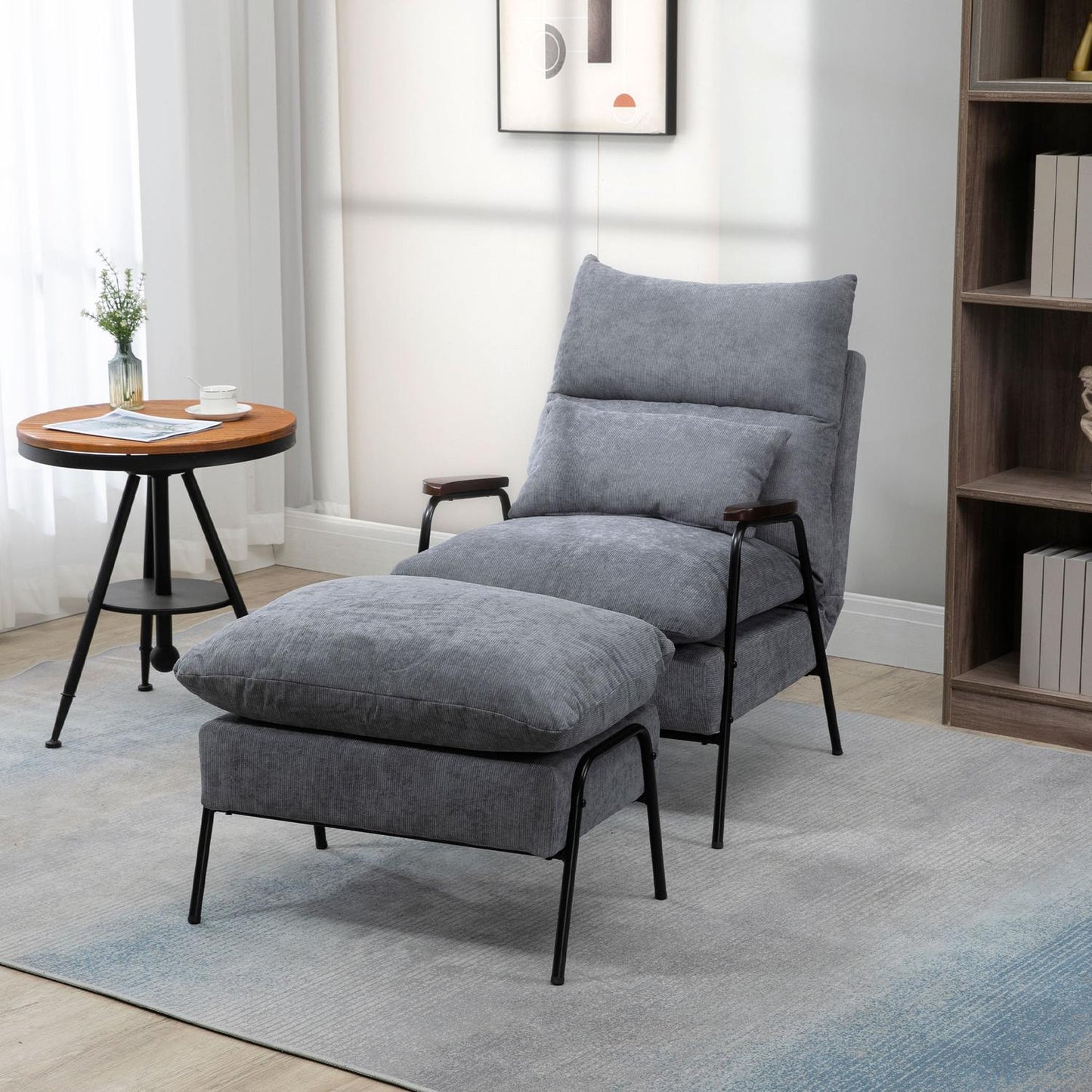 Reclining gray armchair with adjustable backrest and ottoman