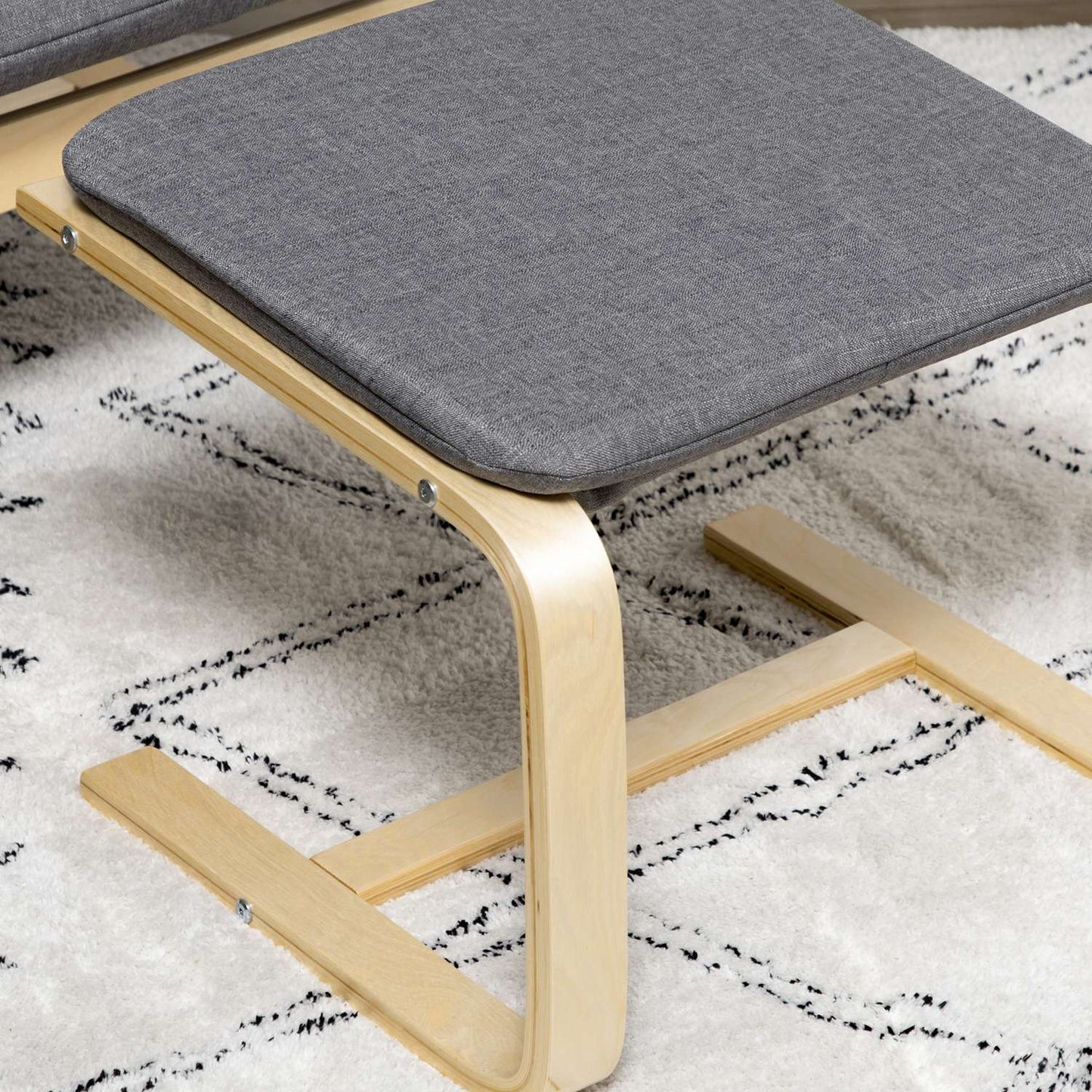 Relaxation chair in gray linen with armrests and footstool