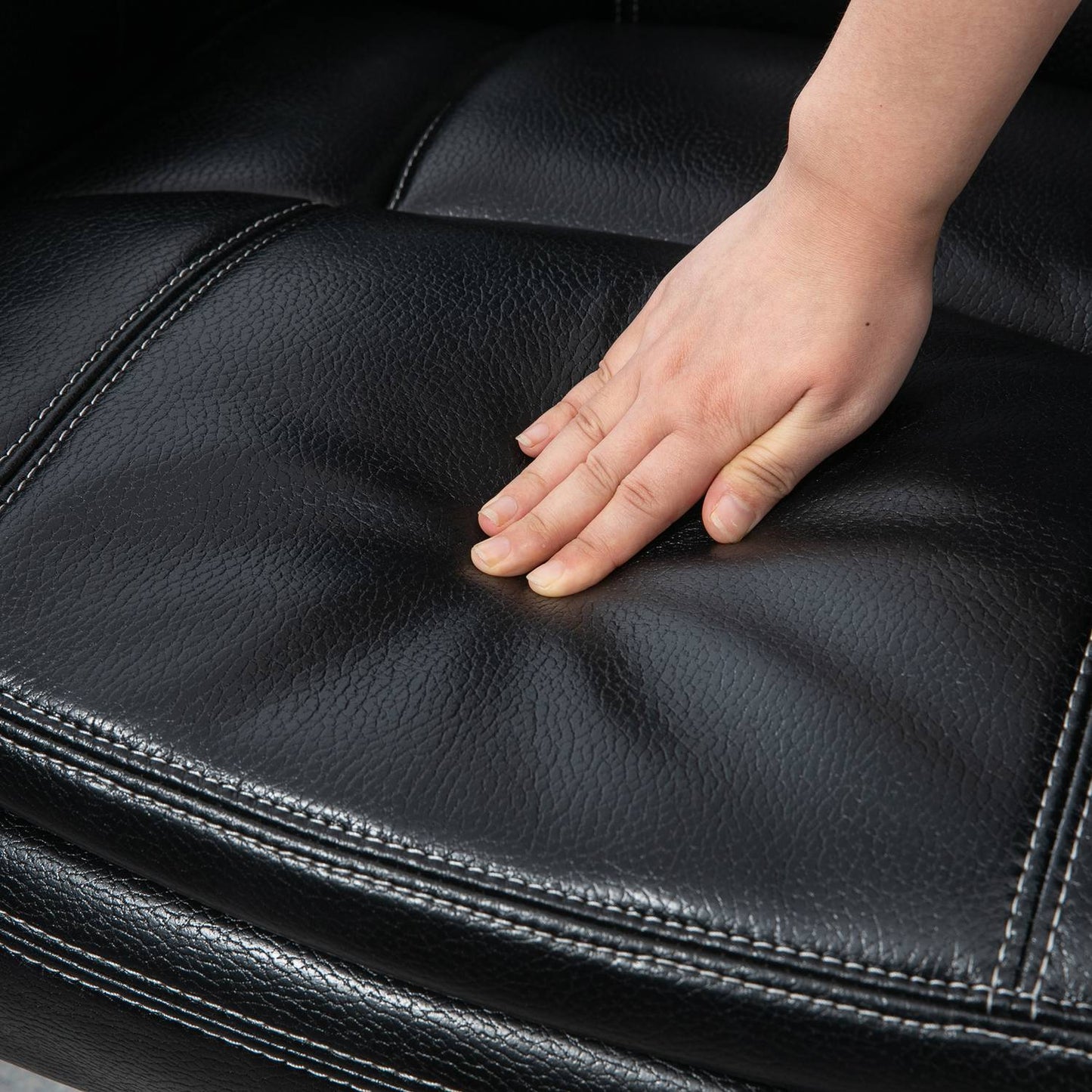 Reclining relaxation chair in artificial leather with ottoman, black