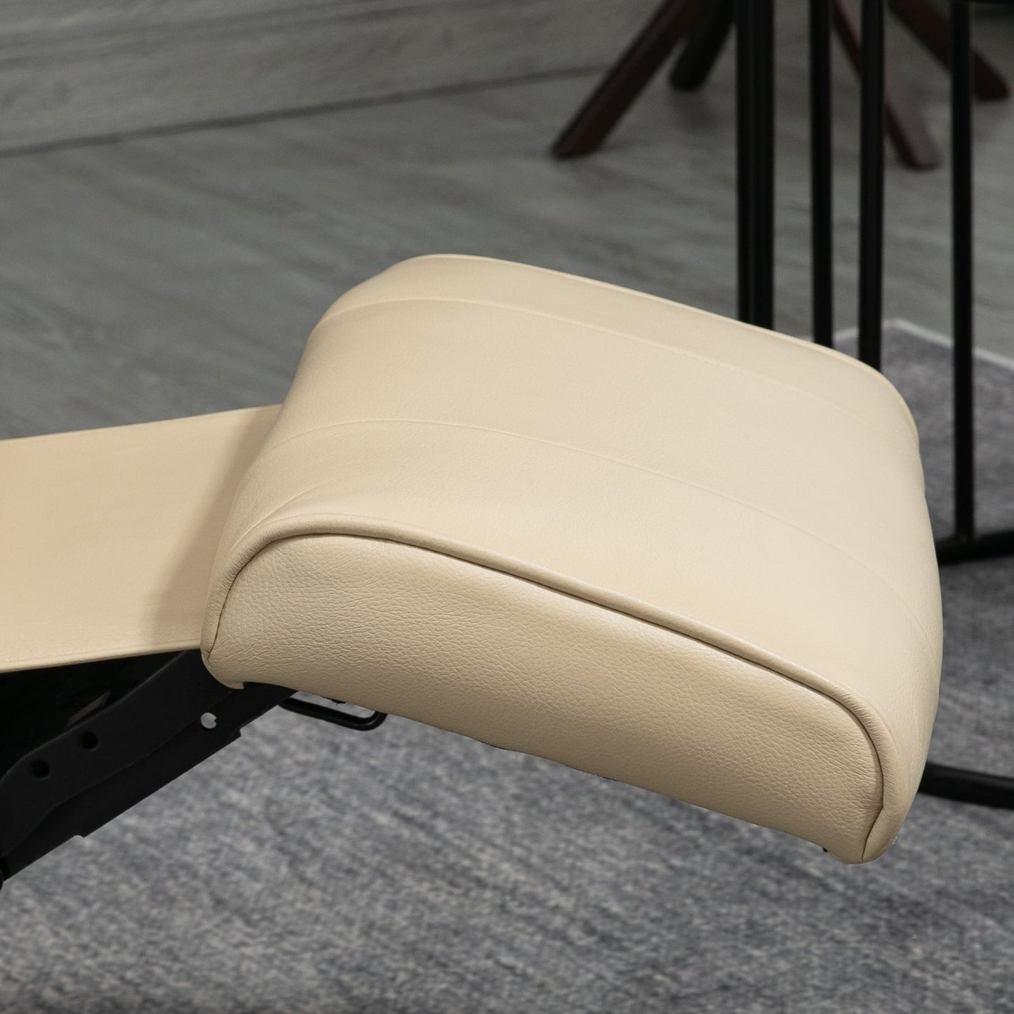 Cream white artificial leather armchair with footrest