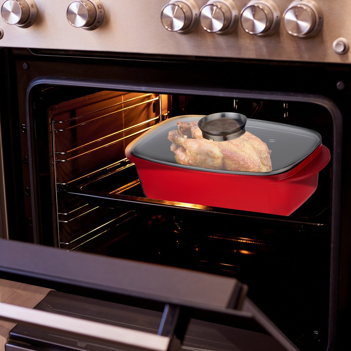 Roaster with lid and seasoning button