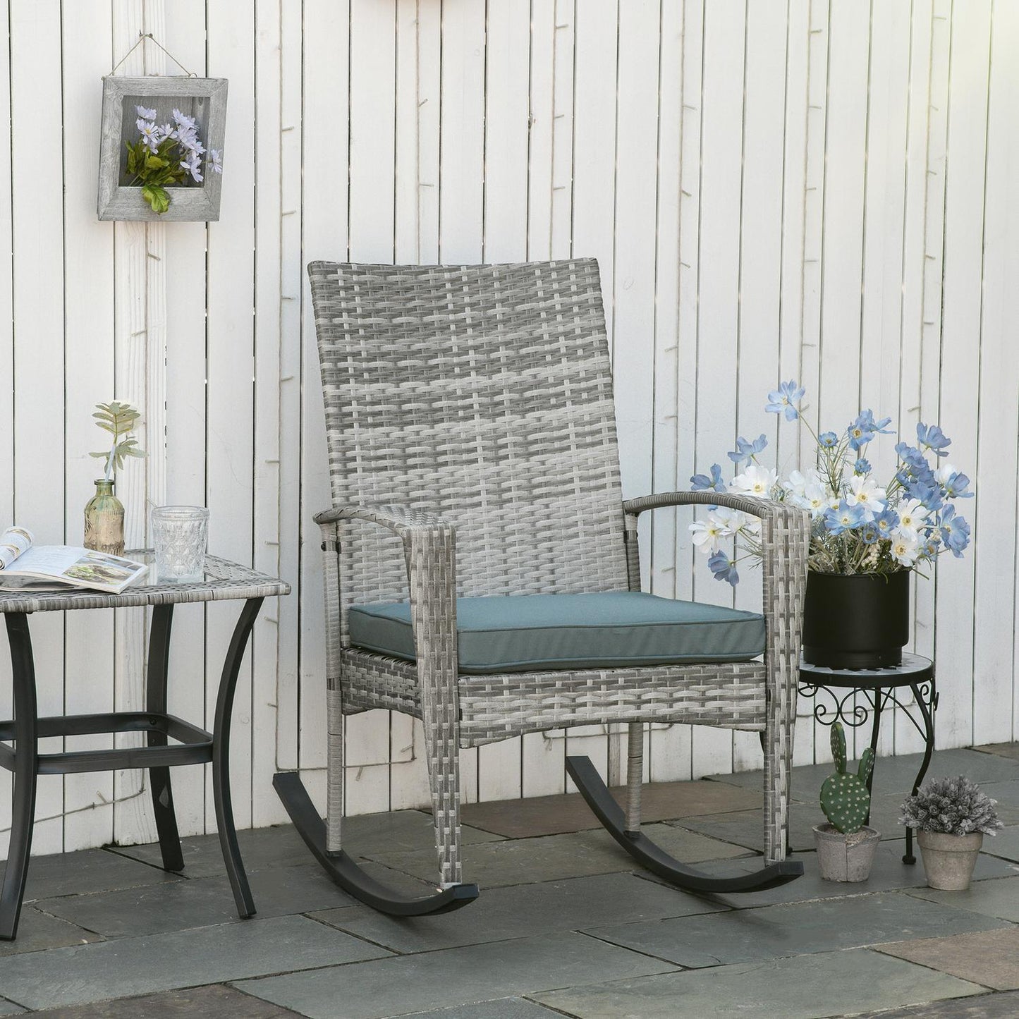 Gray polyrattan garden rocking chair with cushions