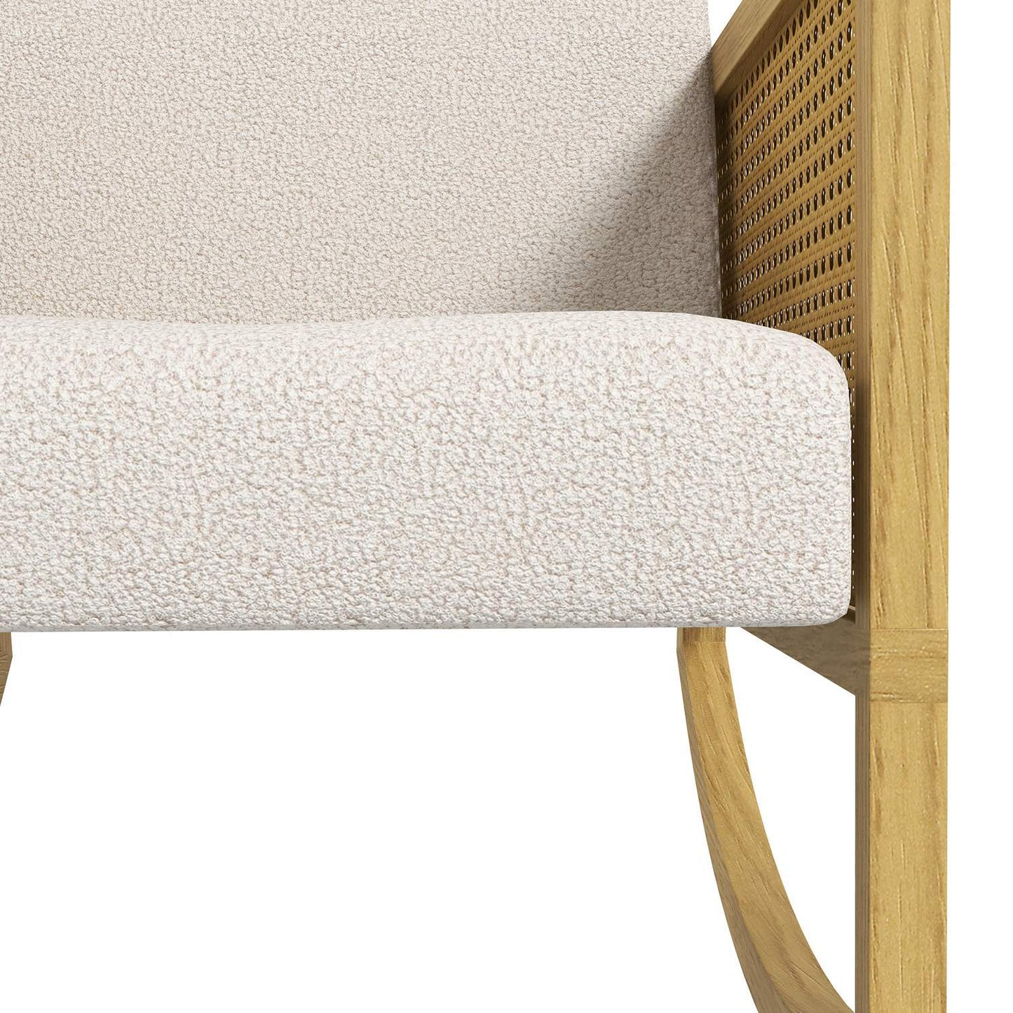 Rocking chair with soft cushions and rattan decor