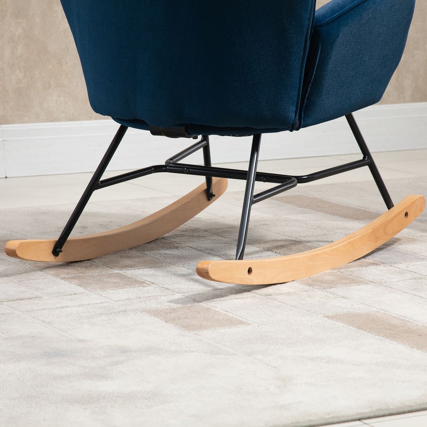Blue Velvet rocking chair with armrests and high comfort padding