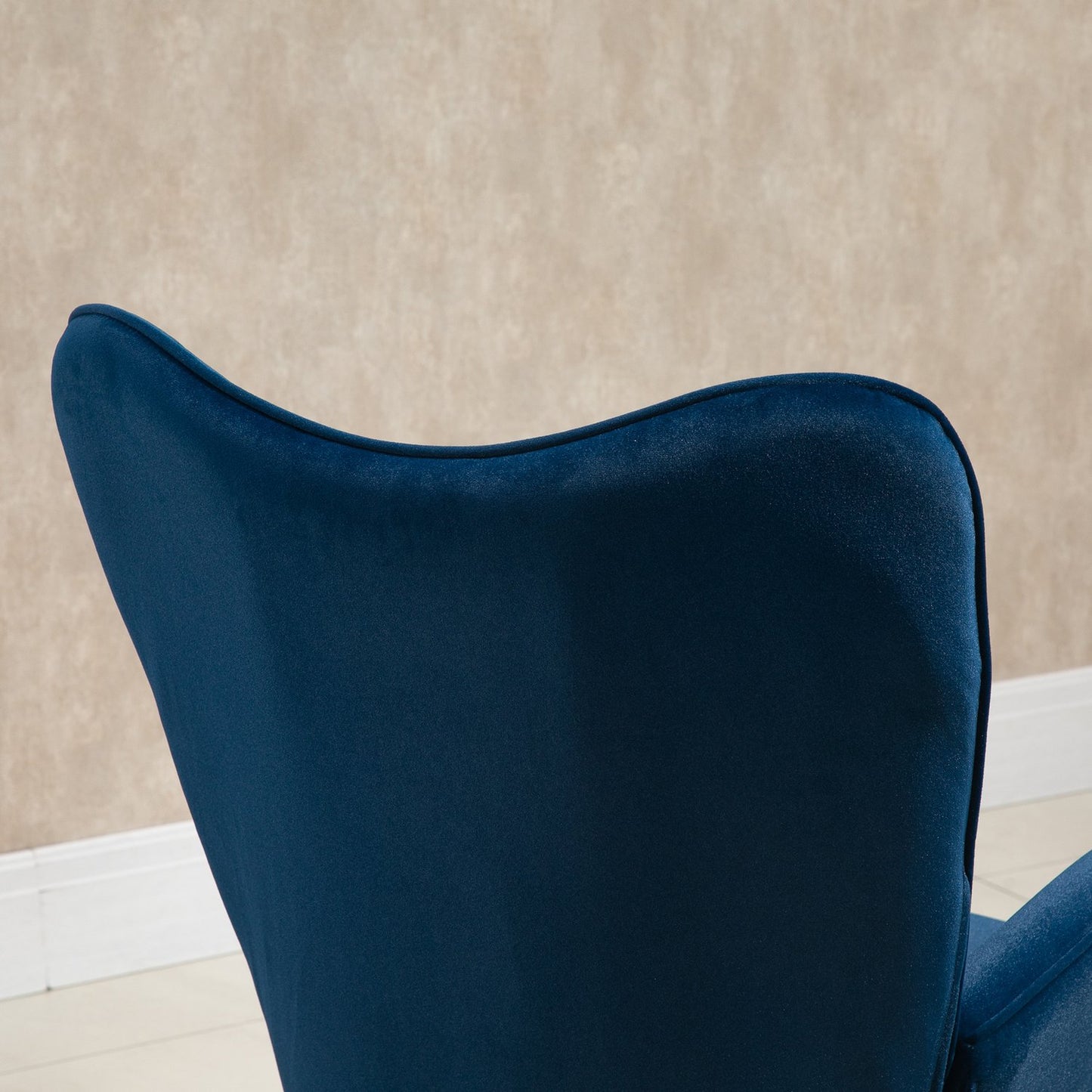 Blue Velvet rocking chair with armrests and high comfort padding