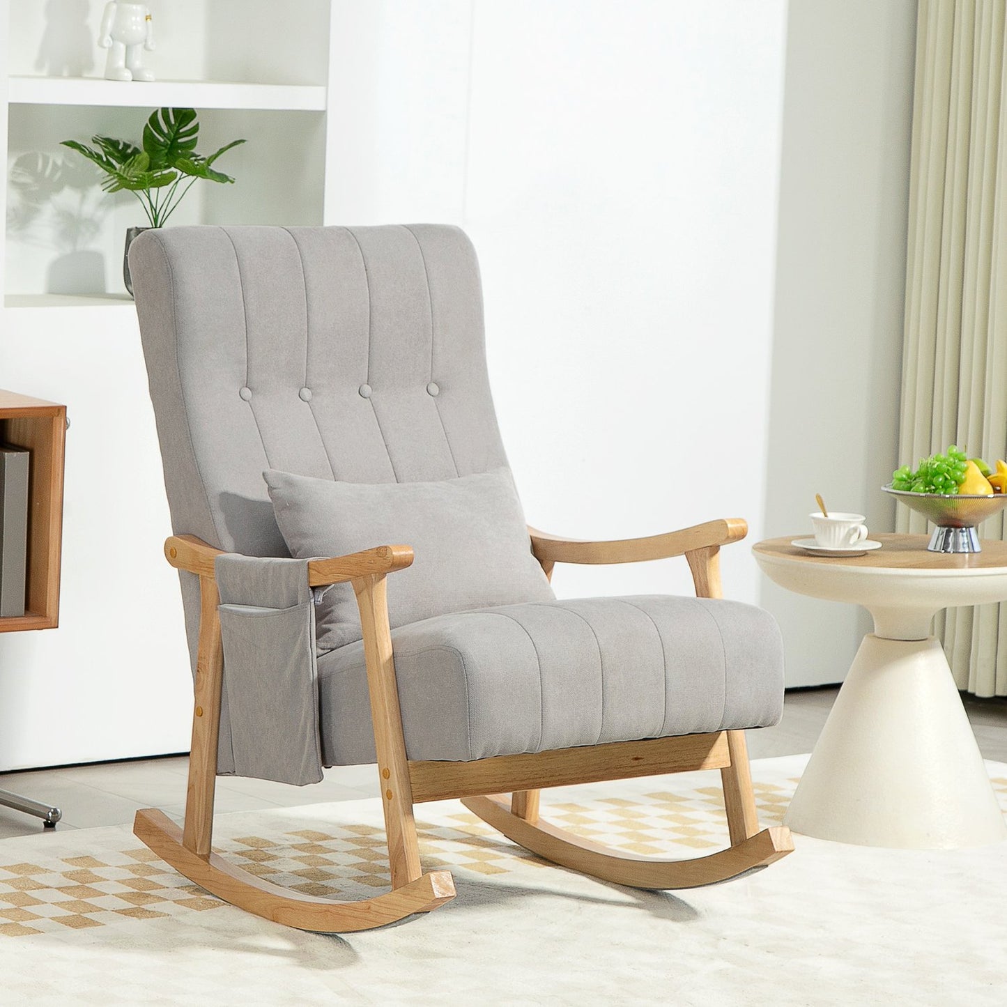 Gray padded rocking chair with lumbar support and side pocket