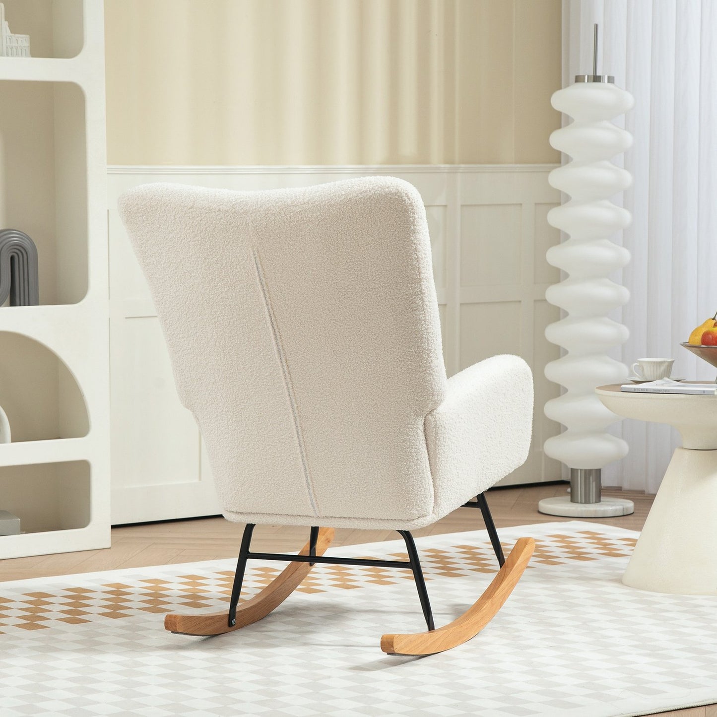 Rocking chair in creamy white velvet with wooden runners