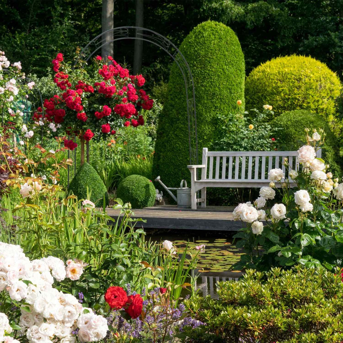 Rose arch with supporting ornaments
