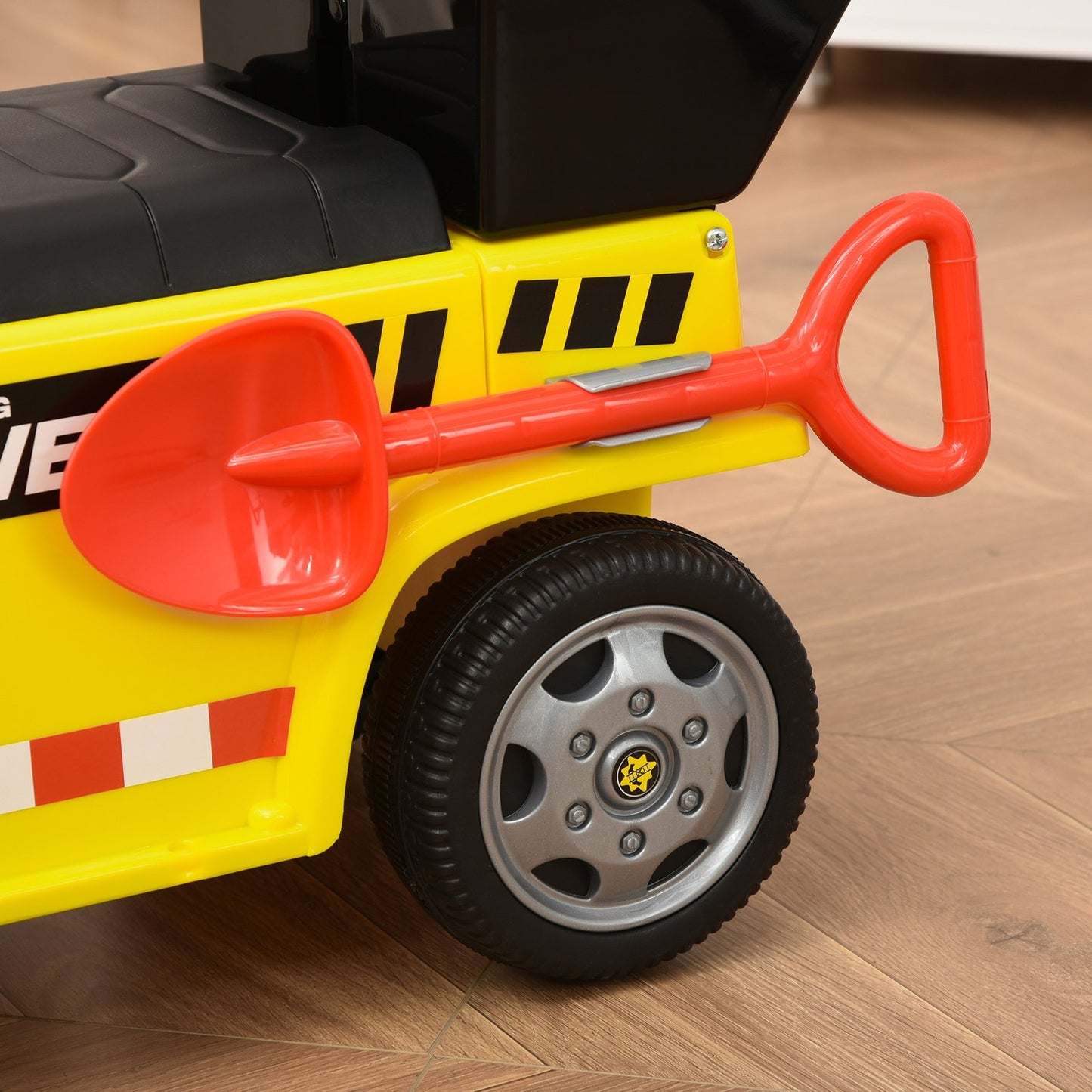 Yellow ride-on excavator for toddlers with shovel and bucket