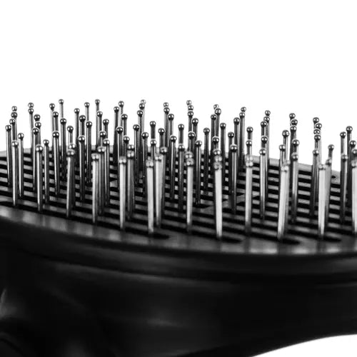 Self-cleaning fur brush