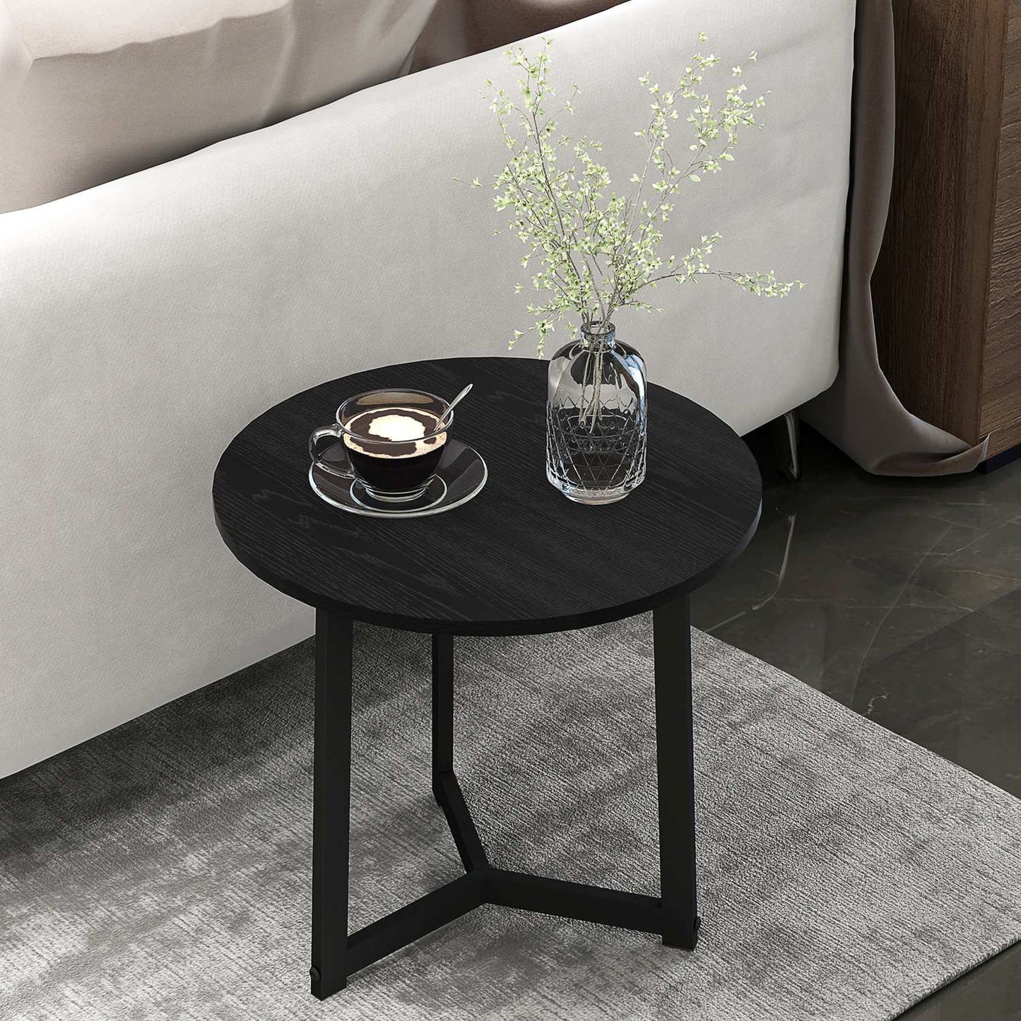 Round coffee table with steel frame - modern black design