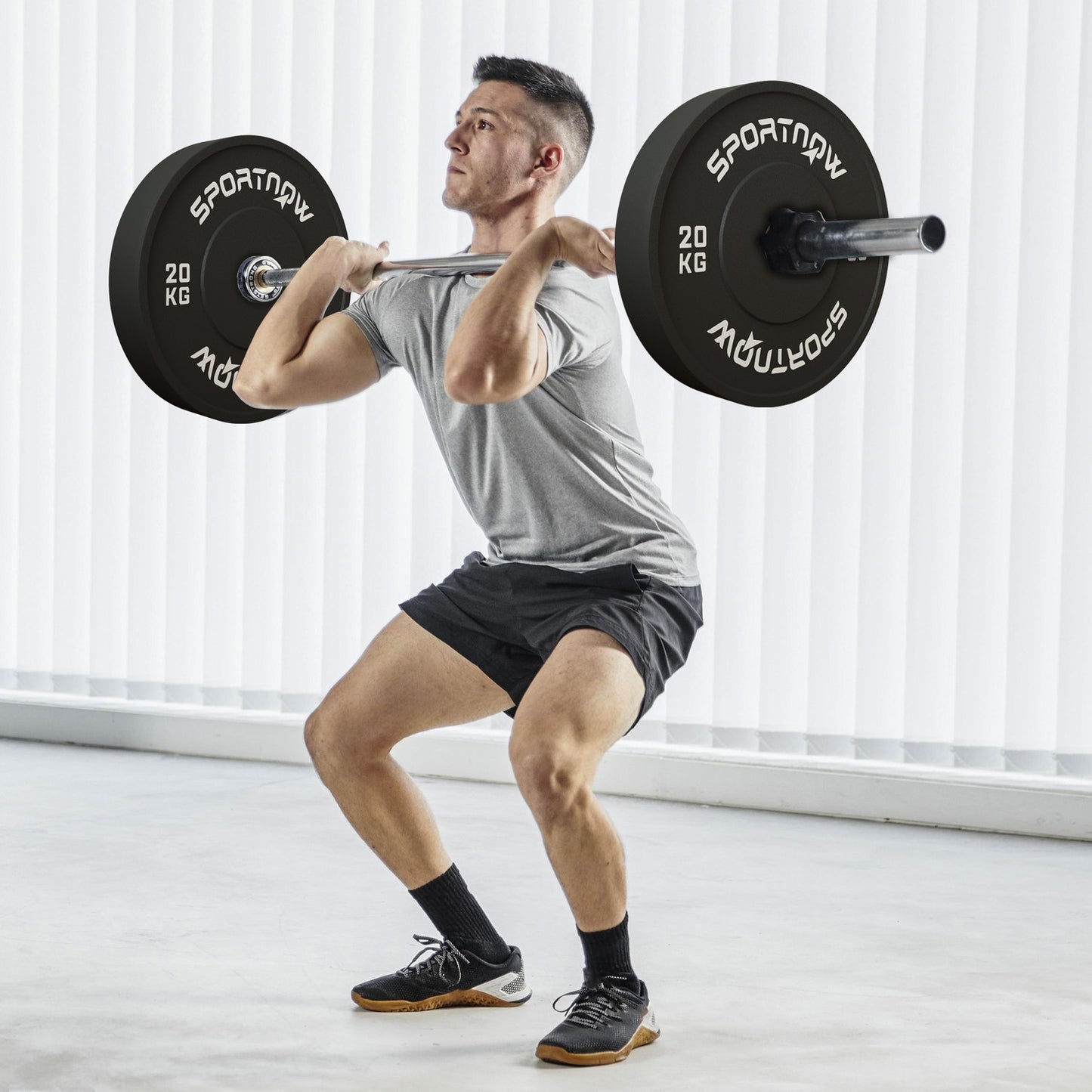 A pair of 20kg dumbbell weights, black, 50mm hole