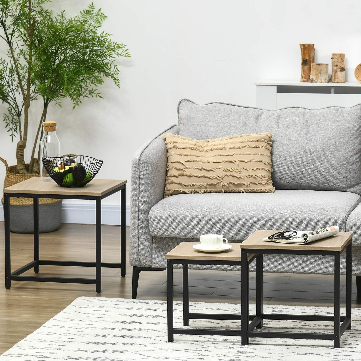 Nesting coffee table set with steel frame and wooden finish