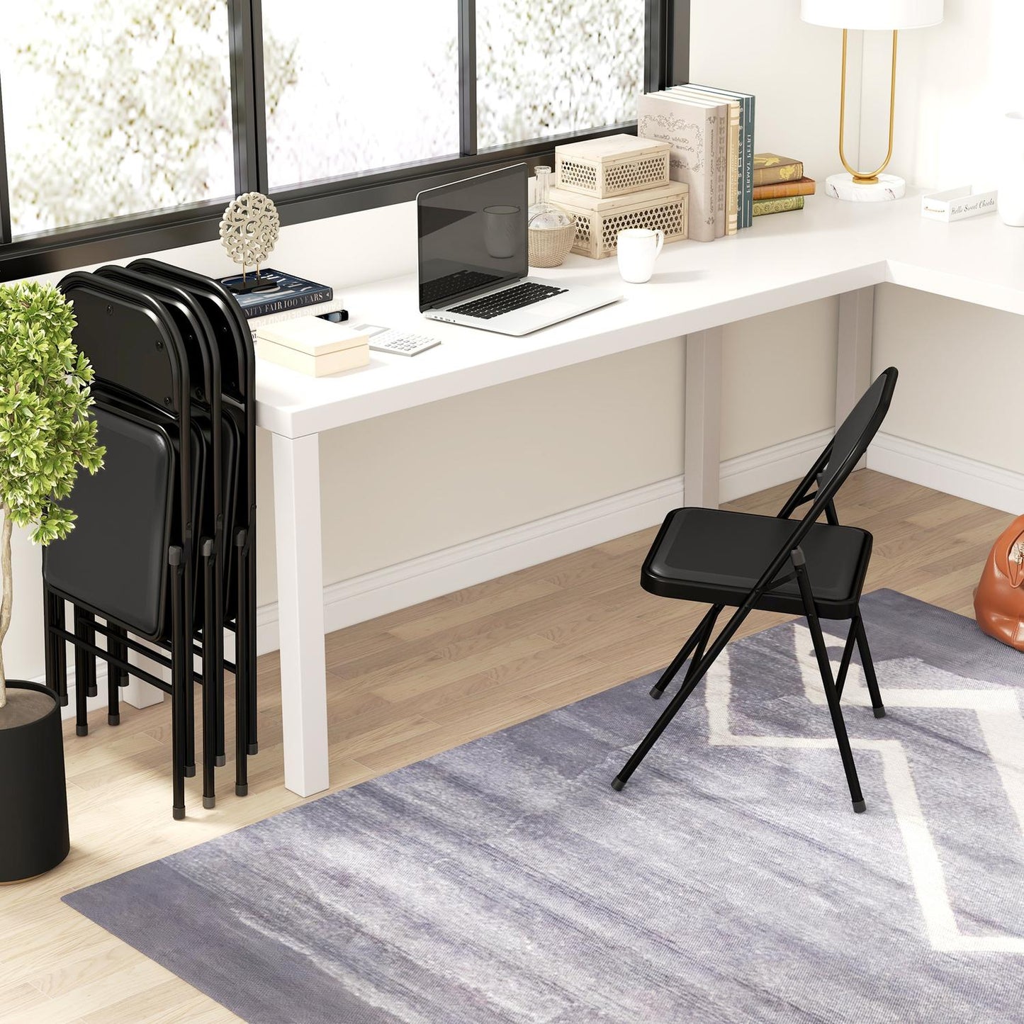 Folding chairs in artificial leather, padded, steel legs, black