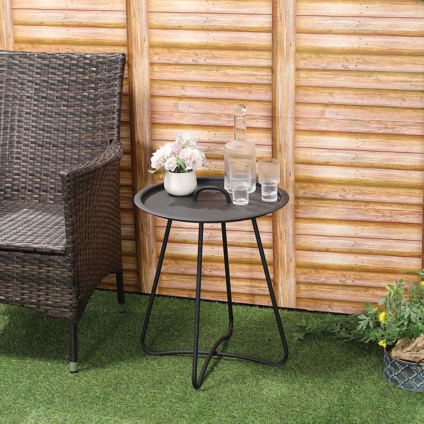 Round black metal side table with carrying handle
