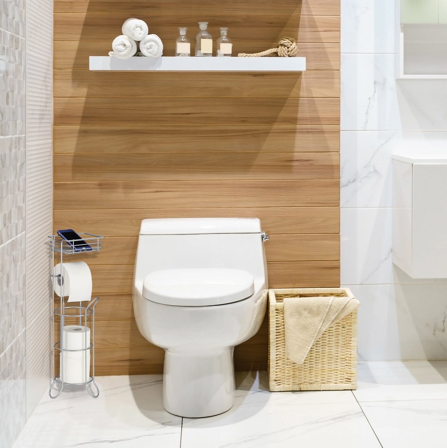 Silver toilet paper holder standing