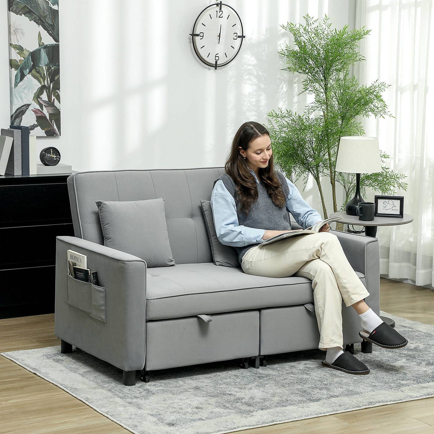 Gray velvet look L-shaped sofa bed with storage, cushions