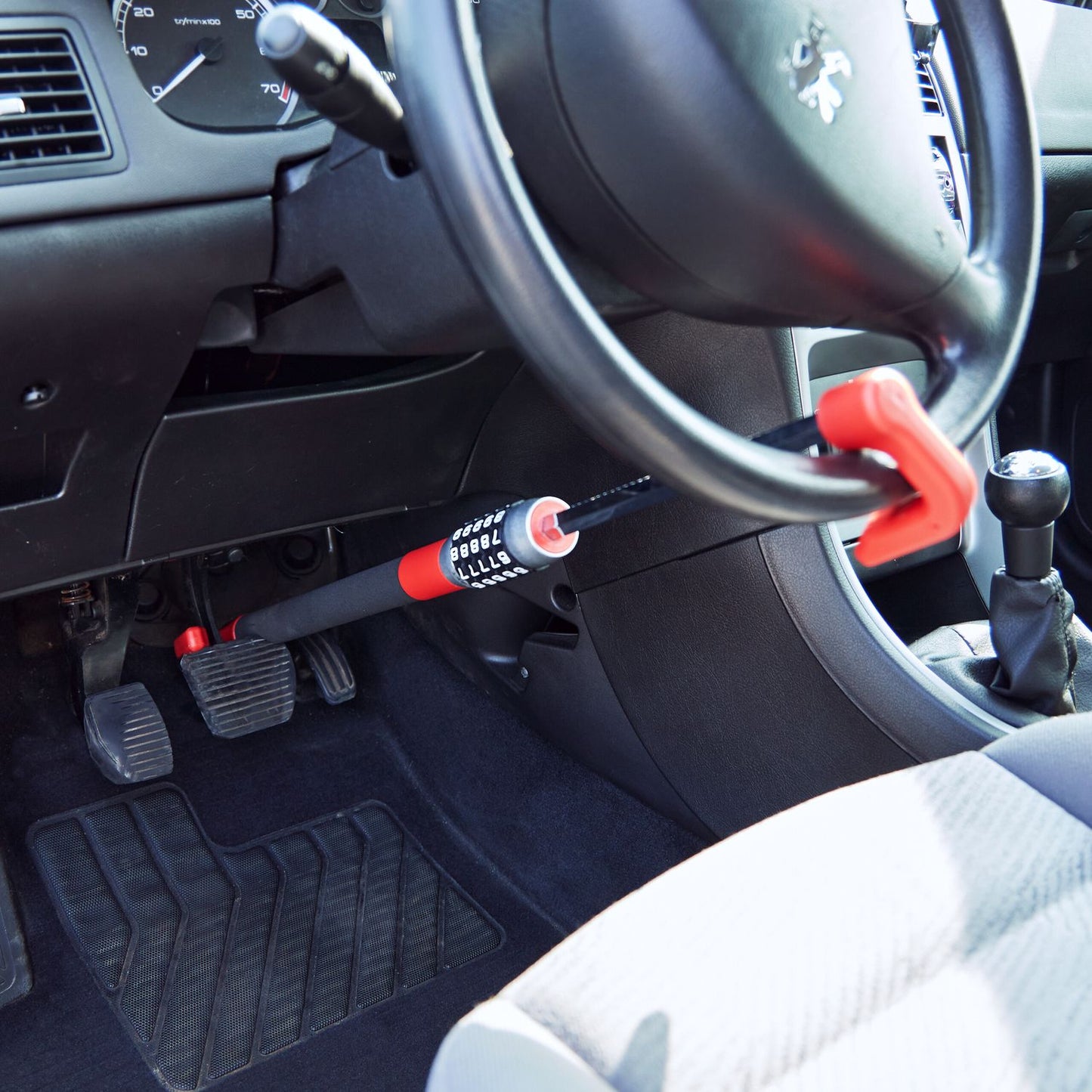 Steering wheel lock with number combination