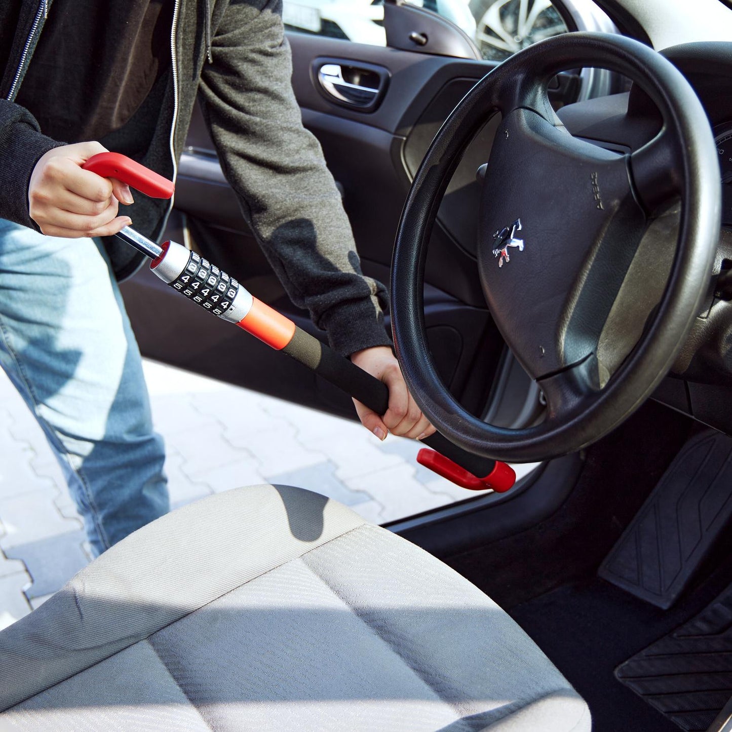 Steering wheel lock with number combination