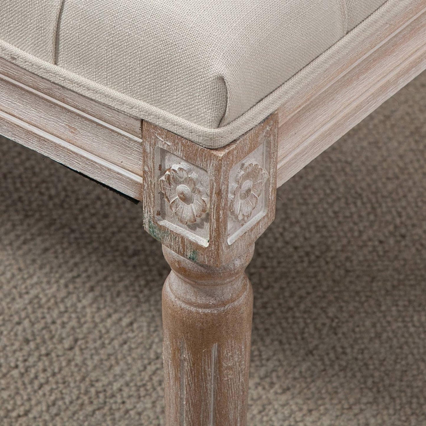 Footstool in linen look with padded seat and wooden legs