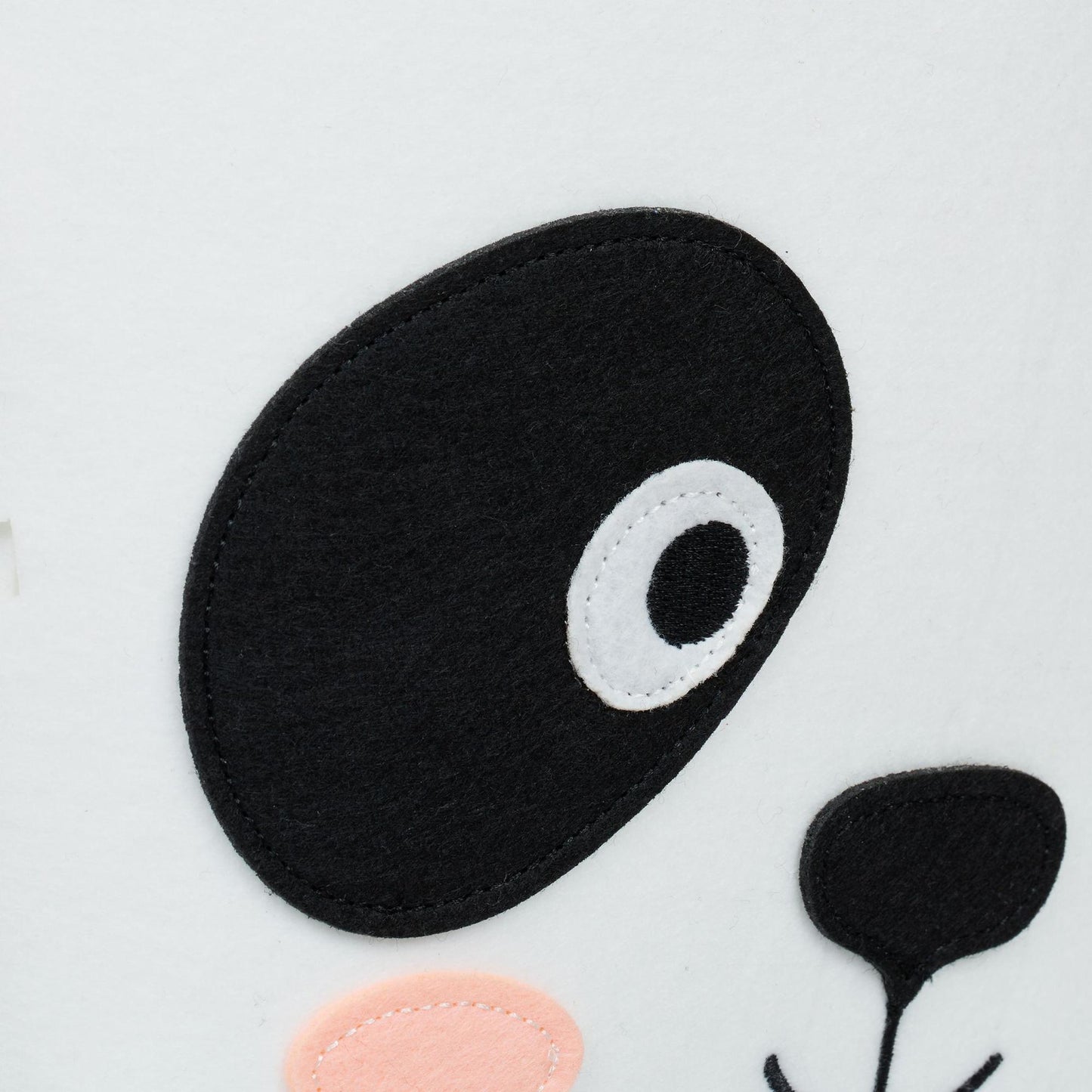 Storage basket in felt with animal motifs