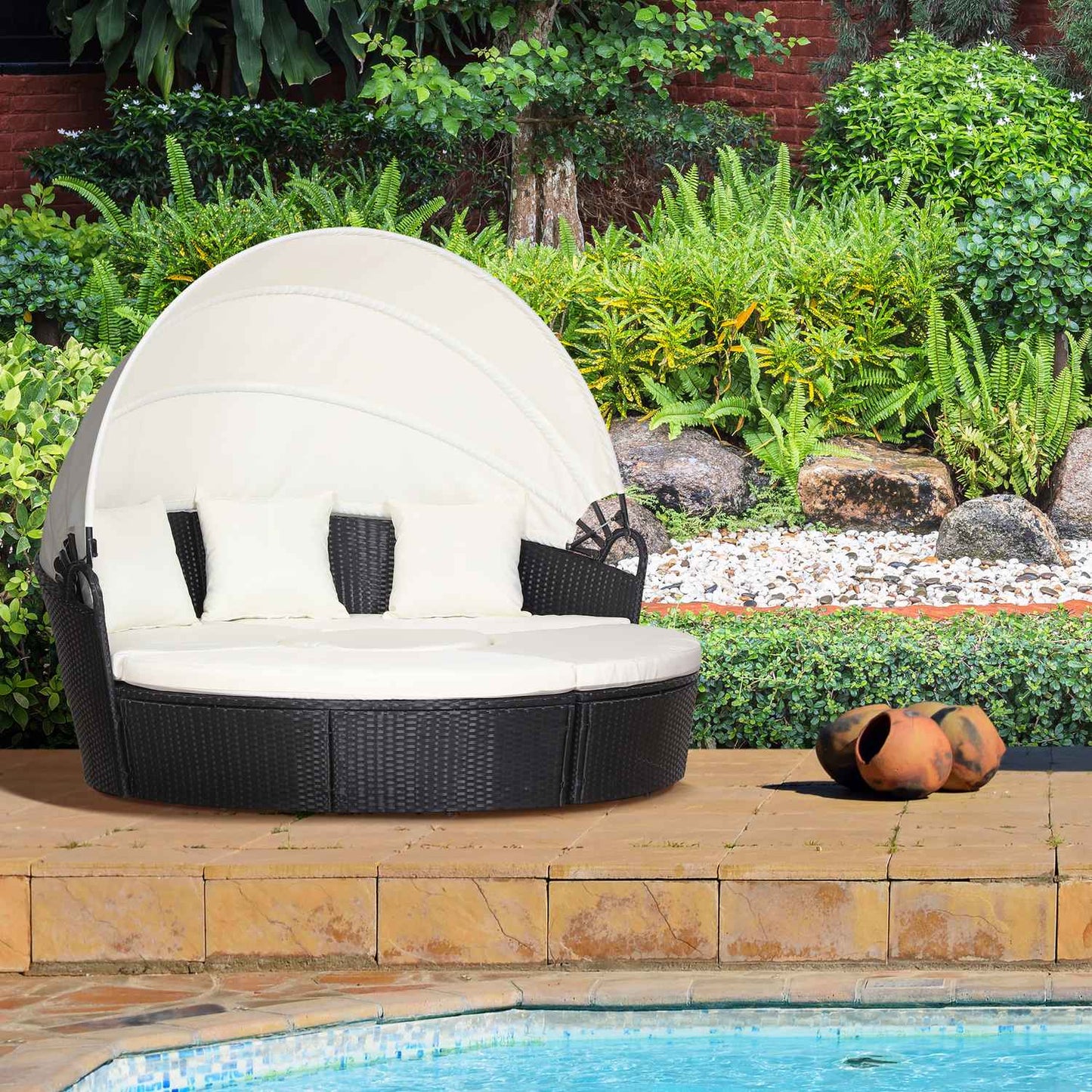 Seat set in rattan with sunshade, cushions and table
