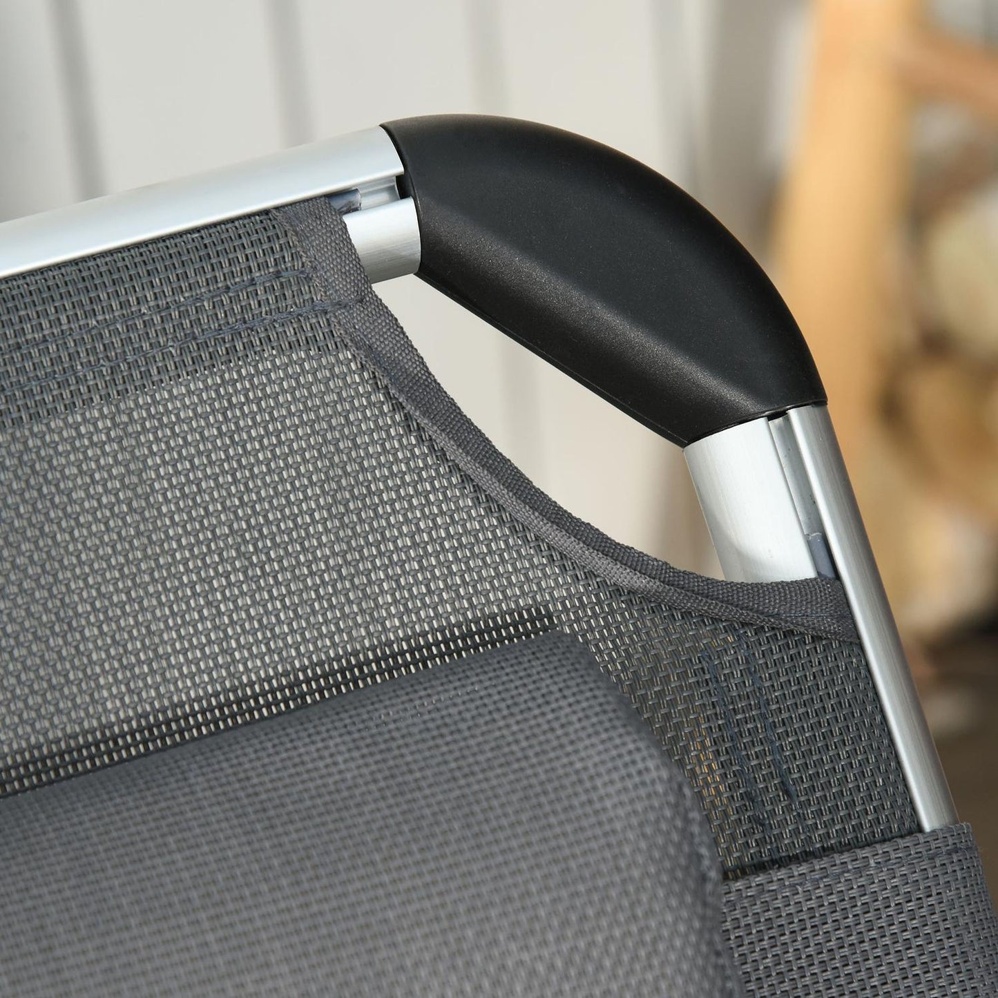 Adjustable sun lounger in gray mesh, foldable and ergonomic