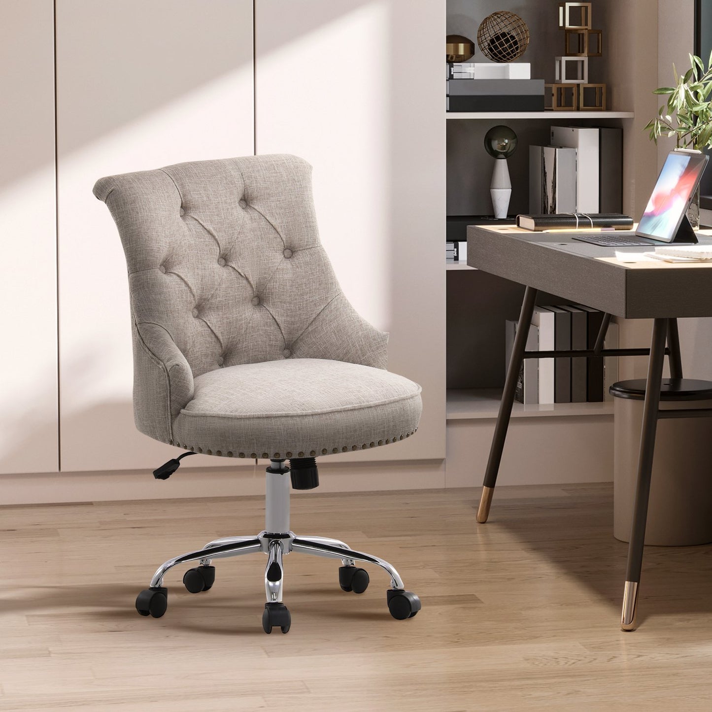 Executive Swivel Chair in light gray linen, adjustable in height