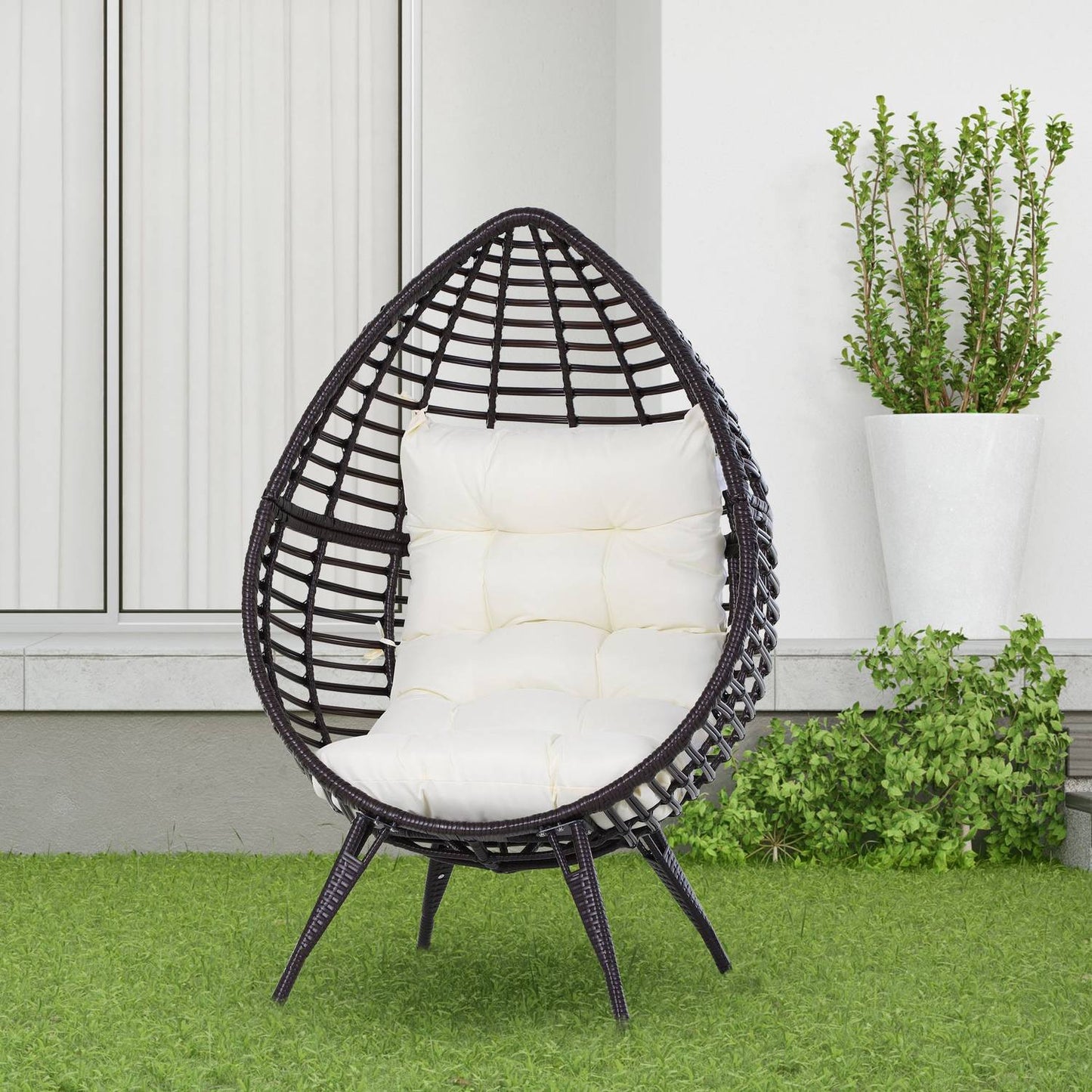 Garden chair in drop-shaped rattan with cushion, brown steel