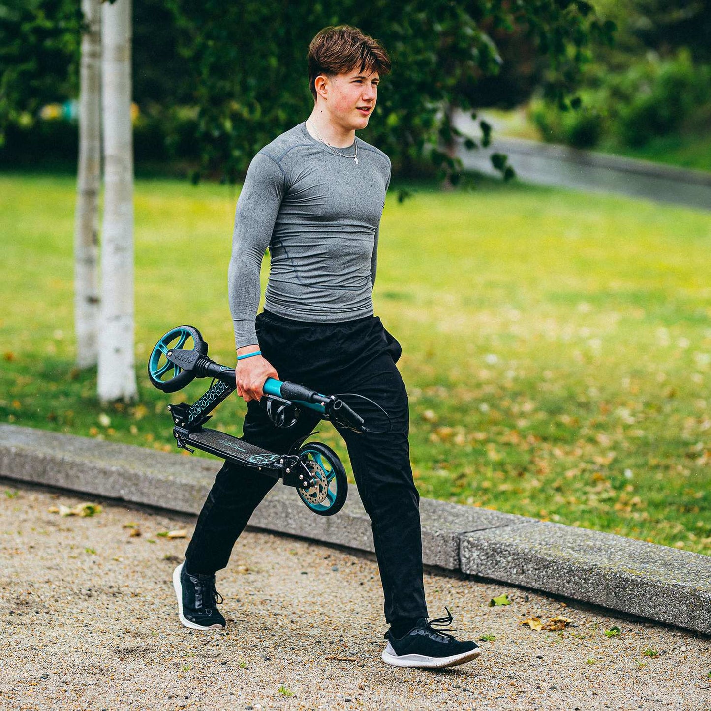 Turquoise Kick Scooter, Adjustable Height, Foldable Design