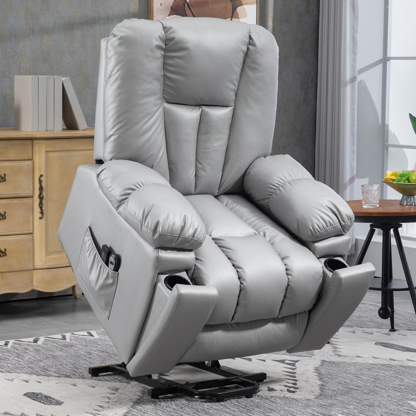 Electric recliner with massage and standing assistance