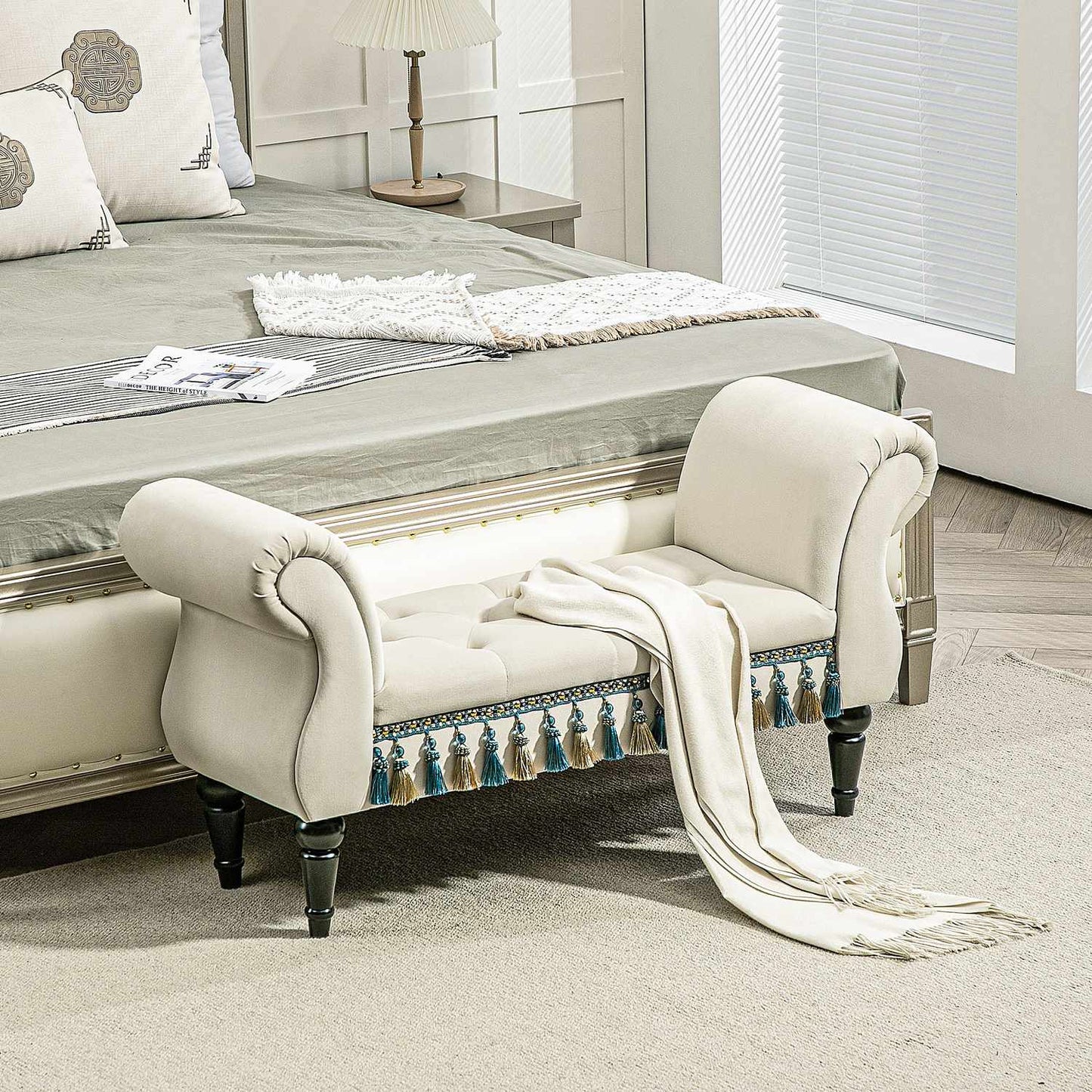Beige velvet upholstered bench with storage and armrests